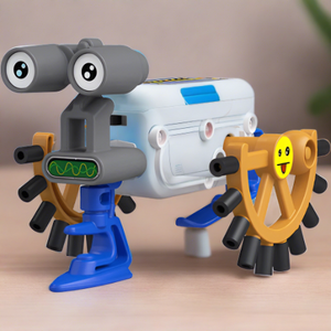 photo of a small kinetic robot made of brown blue gray and white plastic. It has two eyes